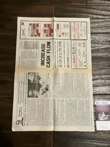 Folded newspaper featuring 1987 Redbird Review with Cardinals Stan Musial autograph