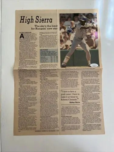 Folded newspaper article featuring 1987 Ruben Sierra signed JSA certified collectible