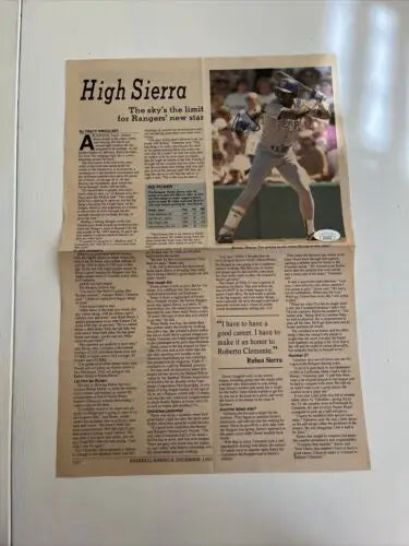 Folded newspaper article featuring 1987 Ruben Sierra signed JSA certified auto memorabilia