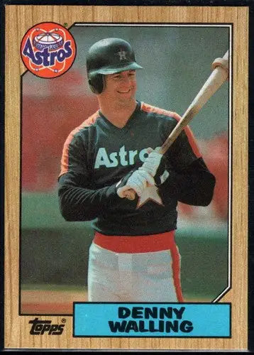 Vintage 1987 Topps Denny Walling NM-MT baseball card with smiling player in batting stance