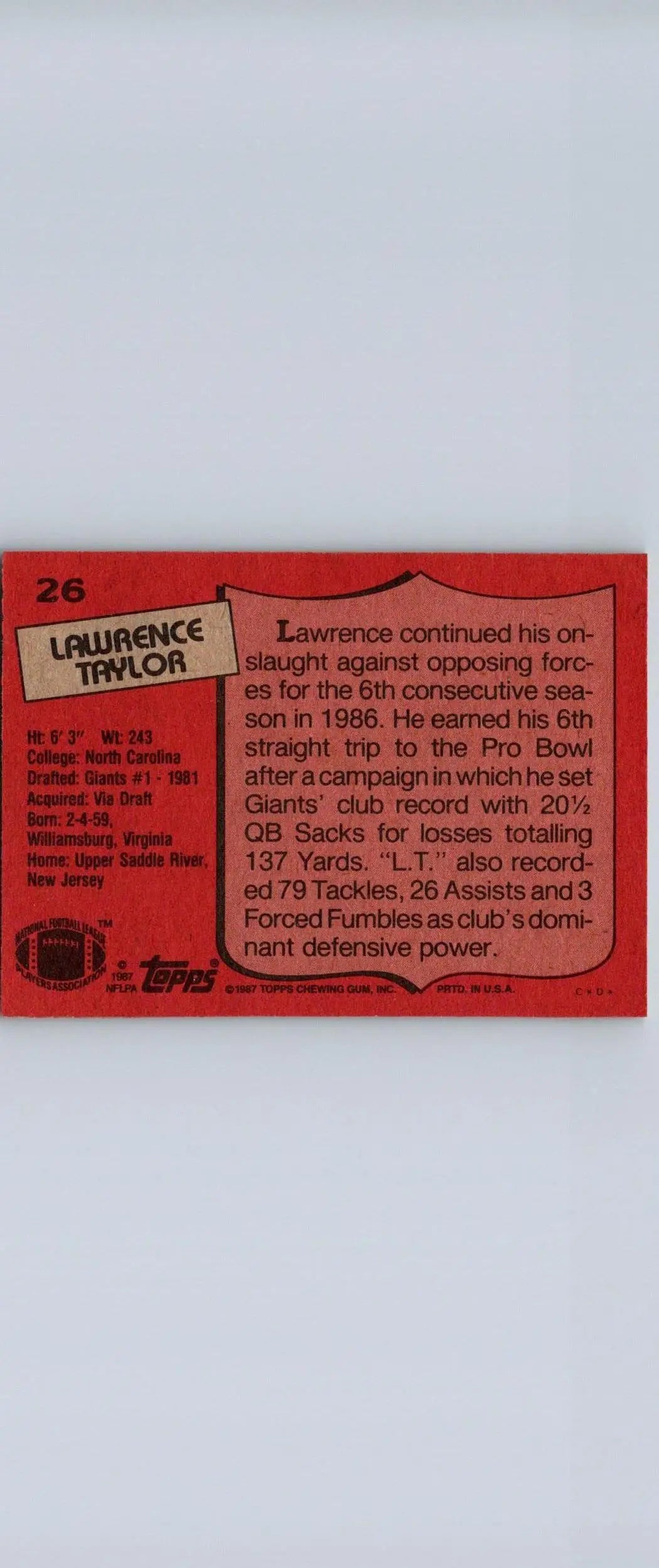 1987 Topps #26 Lawrence Taylor trading card showcasing the football legend in action