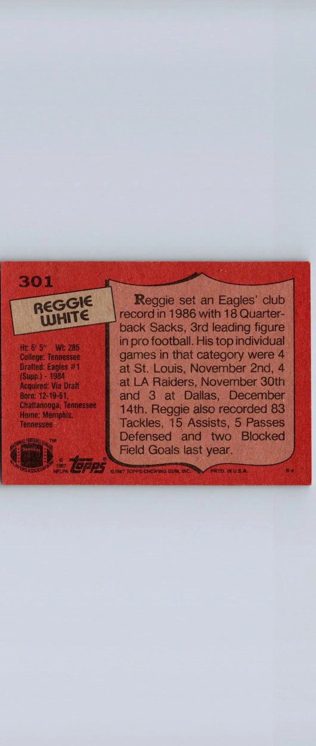 1987 Topps #301 Reggie White trading card featuring the legendary football player