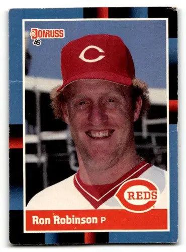 Ron Robinson Cincinnati Reds baseball card from 1988 Donruss #166 displayed