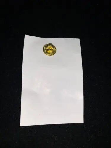 Gold-colored lapel pin on white card featuring Oakland Athletics Unocal #1 Elephant Stomper
