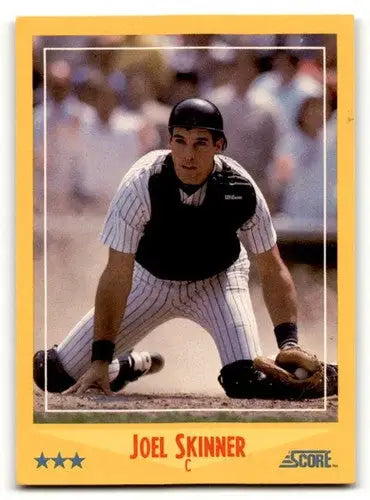 1988 Score Joel Skinner Yankees baseball cards displayed on New York Yankees baseball merchandise