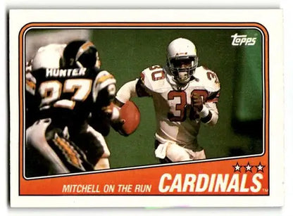 Original gloss football trading card of Cardinals Team Leaders featuring Stump Mitchell