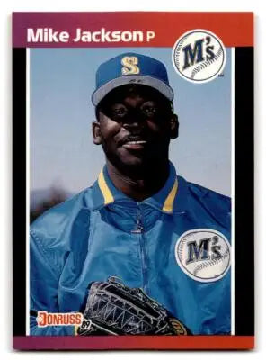 Vintage 1989 Donruss Mike Jackson baseball card 652b featuring pitcher in blue jacket and hat