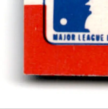 Bottom corner of a red Baltimore Orioles team sticker with MLB logo on 1989 Fleer card