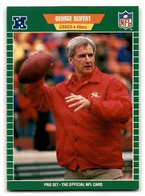 George Seifert NFL trading card in red jacket holding football from Pro Set 1989