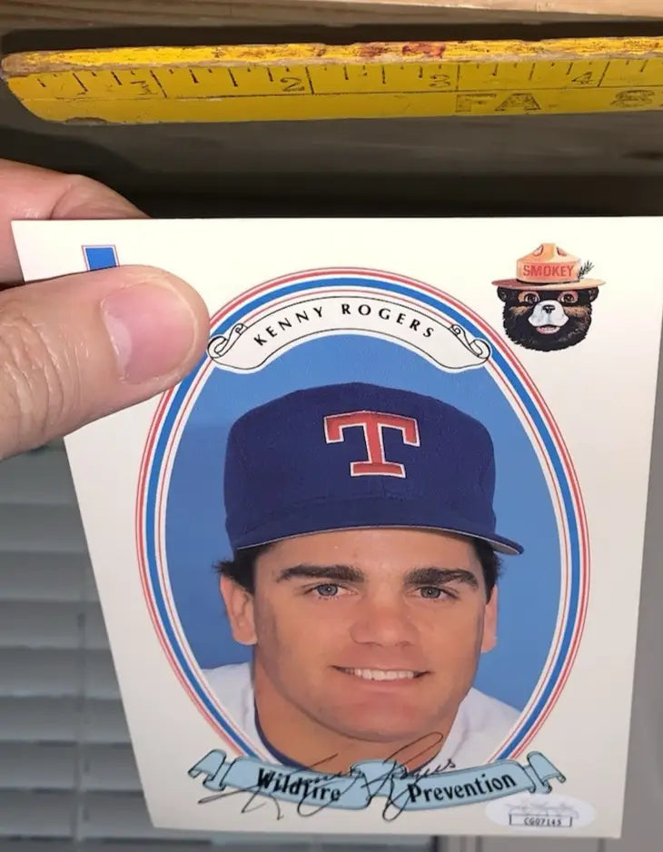 Baseball card of Kenny Rogers in Texas Rangers cap from 1989 Smokey the Bear set