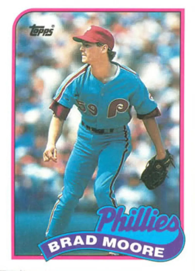 1989 Topps Brad Moore Rookie Baseball Card of Philadelphia Phillies in light blue uniform