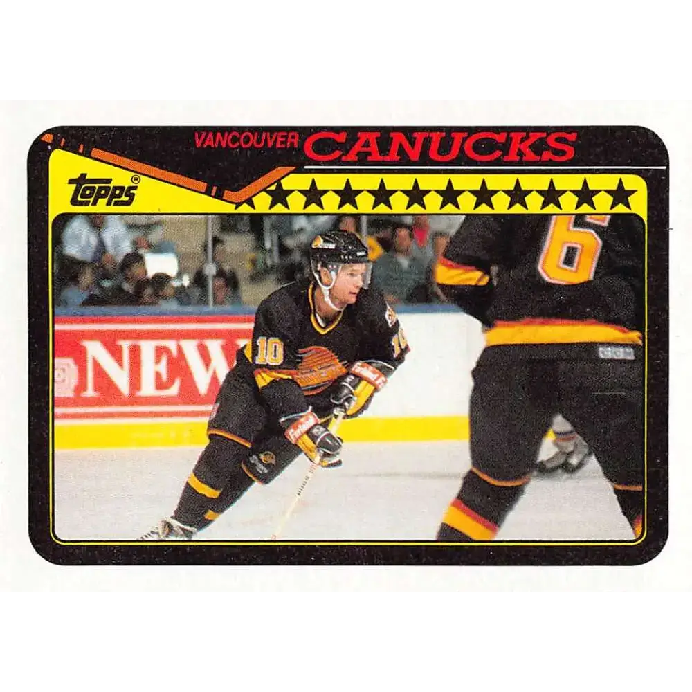 1990-91 Topps #59 Canucks Team NM-MT Vancouver Canucks Hockey Card - Hockey Card Single