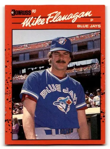 1990 Donruss Mike Flanagan Toronto Blue Jays baseball card displaying Toronto Blue Jays memorabilia