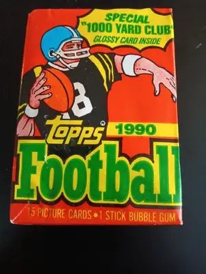 1990 Topps Football - Sealed wax pack. One pack. 15 cards. NFL. EX - EX+ - Football Card Box