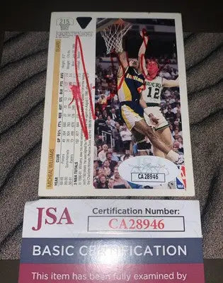 Signed basketball card featuring Michael Williams from Upper Deck with authentication and JSA auto