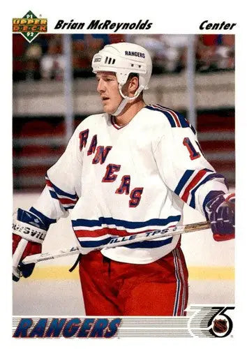 Hockey player in Rangers uniform on 1991-92 Upper Deck Brian McReynolds card with original gloss