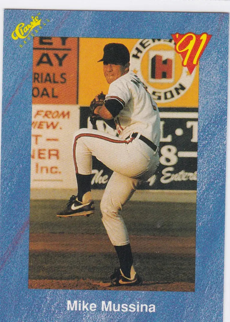 Baseball player in white uniform pitching, featuring T17 Mike Mussina RC Hagerstown