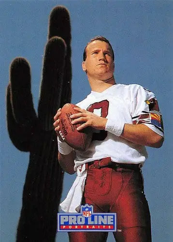 Original gloss Timm Rosenbach Pro Line Portraits featuring a man in football gear next to a saguaro cactus