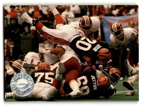 Original gloss football players in a scrum on Pro Set Platinum card featuring Craig Taylor
