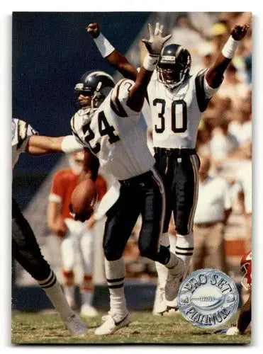 Football players celebrating on the field from 1991 Pro Set Platinum San Diego Chargers card