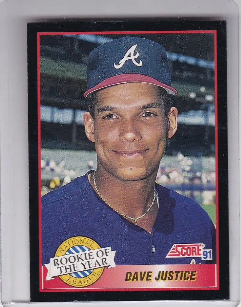 Baseball card of Score David Justice smiling in Braves cap, 1991 Rookie of the Year