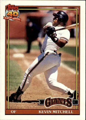 Original gloss Kevin Mitchell baseball card from 1991 Topps #40 featuring Giants player