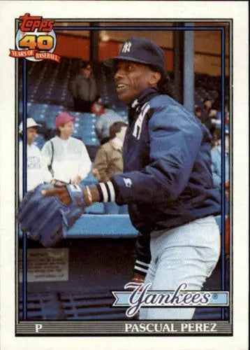 Original gloss baseball card of Pascual Perez NM-MT from 1991 Topps #701 Yankees