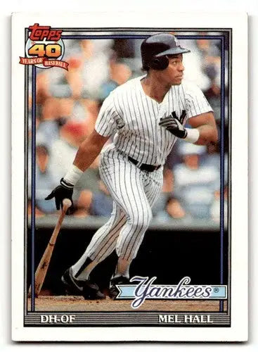 1991 Topps Mel Hall Yankees baseball card with original gloss in EX/NM condition