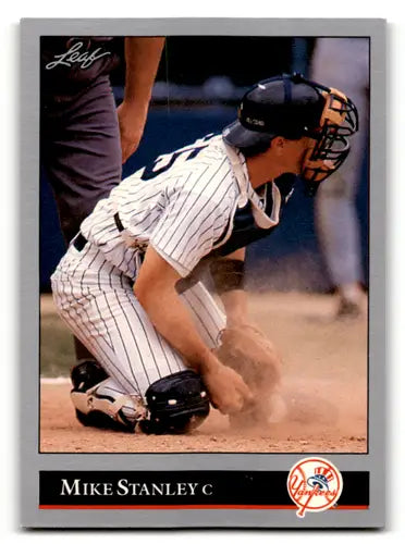 Original gloss baseball card featuring Mike Stanley as a catcher from 1992 Leaf