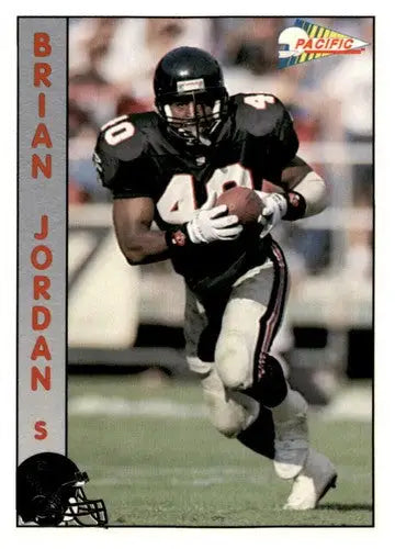 Football player in action on 1992 Pacific #335 Brian Jordan NM Near Mint Falcons card with original gloss