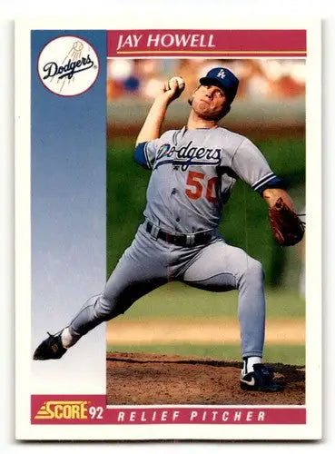 1992 Score Jay Howell Los Angeles Dodgers baseball card showing pitching follow-through