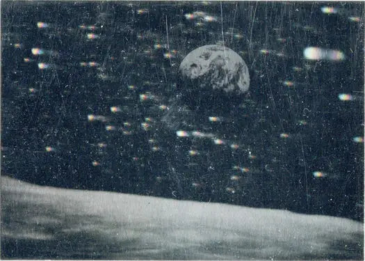 Earth rising above the lunar horizon in 1992 Space Ventures trading card