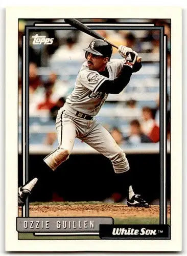 Original gloss Ozzie Guillen baseball card from 1992 Topps #210 featuring White Sox ID:43514