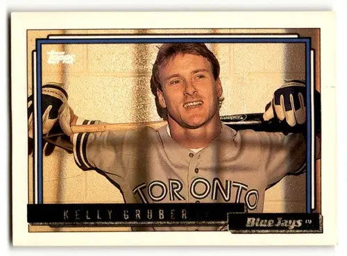 Original gloss Kelly Gruber Toronto baseball card from 1992 Topps #298 featuring Gruber Toronto Blue