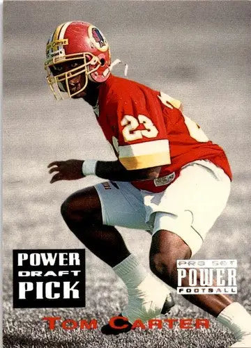 Football player in action featuring Tom Carter from 1993 Pro Set Power original gloss card