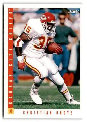 1993 Score #160 Christian Okoye trading card featuring the NFL star’s iconic image