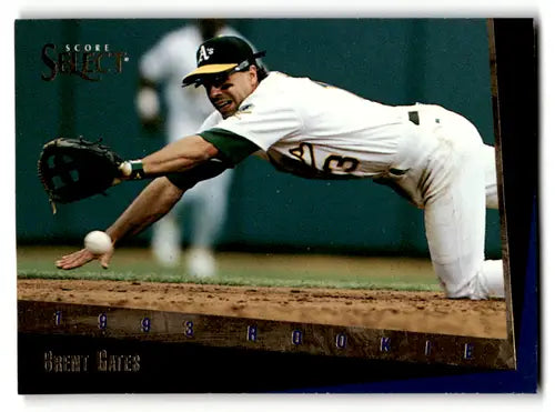 Baseball card featuring a diving player from 1993 Select Rookie Traded Brent Gates NM near mint