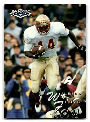 Football player William Floyd with ball from Classic Assets trading cards