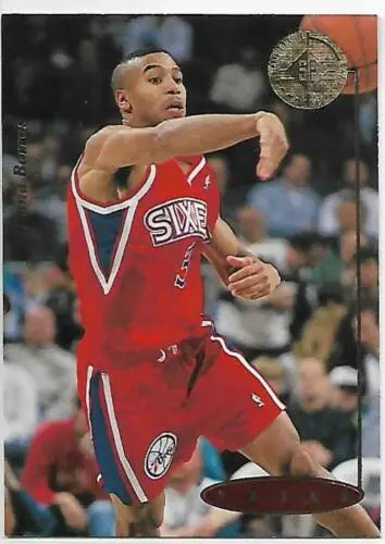 Basketball player in red uniform on 1994-95 SP Championship #104 Dana Barros card