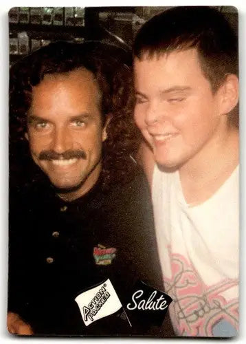 Action packed trading card featuring Kyle Petty with two people, original gloss NM-MT