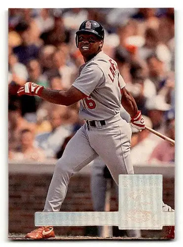 Original gloss baseball card featuring Ray Lankford in batting stance for Cardinals baseball