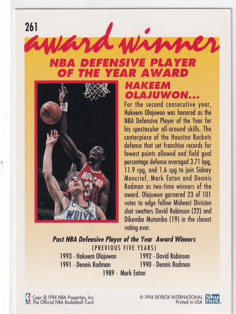 1994 SKYBOX #261 HAKEEM OLAJUWON DEFENSIVE PLAYER OF THE YEAR- HOUSTON ROCKETS - Basketball Card Single