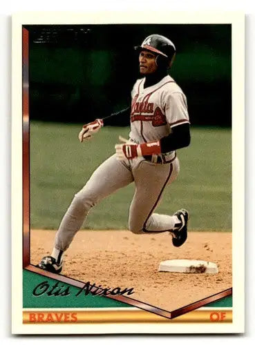 Original gloss Otis Nixon Atlanta Braves baseball card from 1994 Topps #52