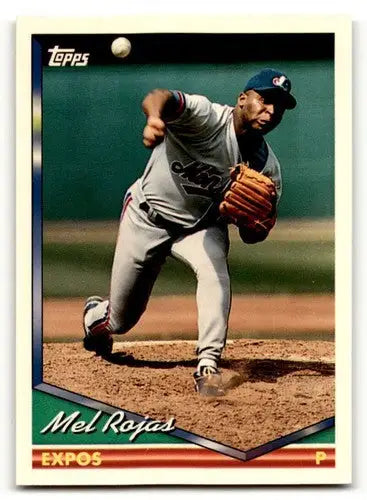 Original gloss 1994 Topps Mel Rojas NrMt baseball card featuring pitcher in action for the Expos