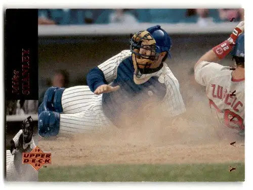 Baseball card of Yankees baseball catcher sliding into home from 1994 Upper Deck series