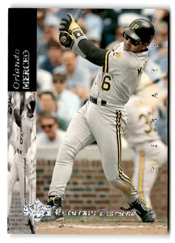 Original gloss baseball trading card featuring Orlando Merced in grey uniform from Upper Deck Electric Diamond