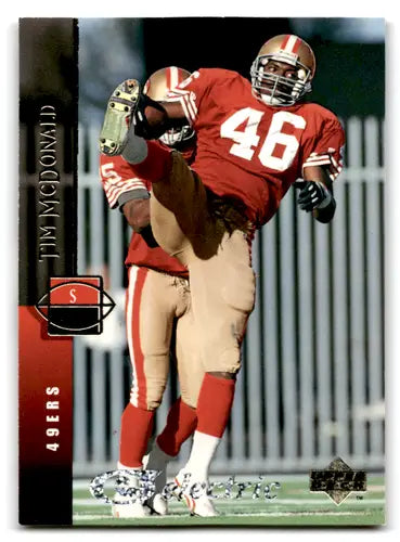 Football player in action on 1994 Upper Deck Electric Silver Tim McDonald card