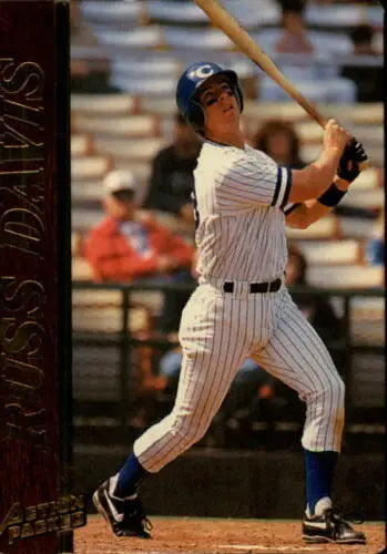 Baseball player swinging bat on 1995 Action Packed #9 Russ Davis NM-MT card, original gloss