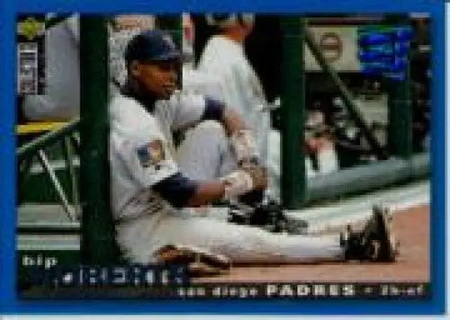 Original gloss baseball trading card featuring Bip Roberts in Padres uniform sitting on ground