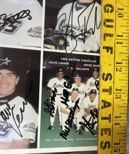 Signed 1995 Houston Astros checklist featuring autographs of Craig Biggio and Jeff Bagwell